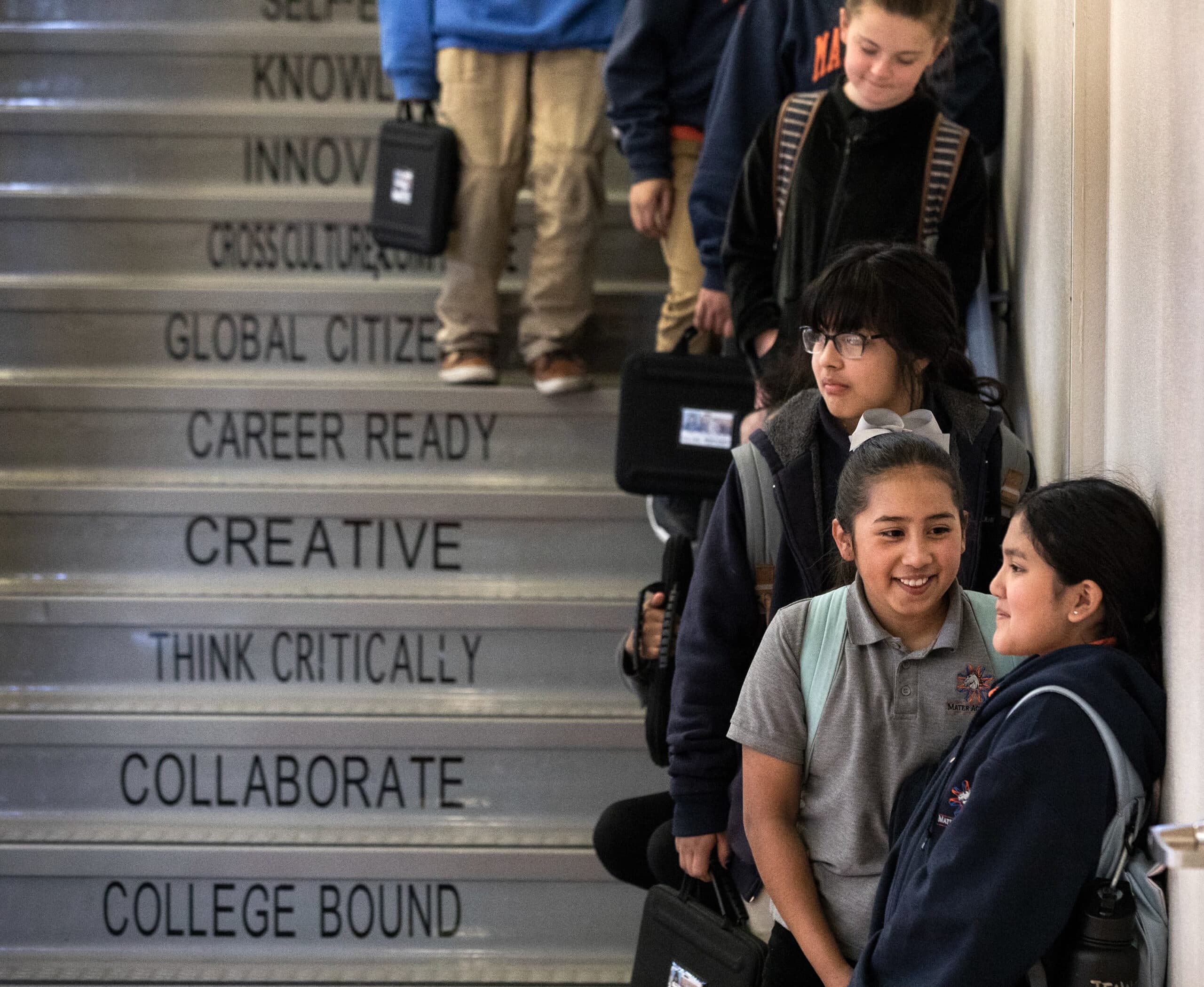 What are charter schools, and how do they compare to traditional school districts?